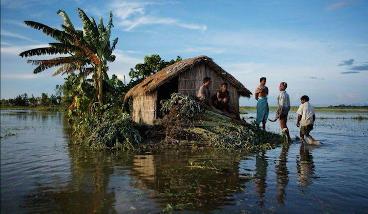 Bangladesh flooded house - Impact of climate change
