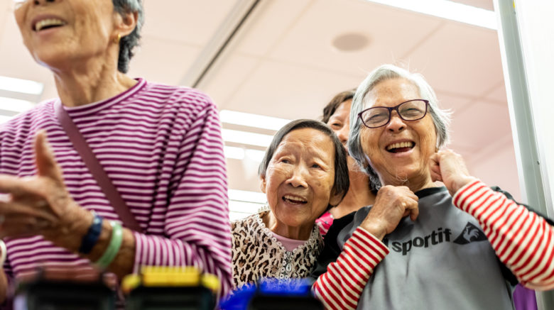 Elderly learning about recycling