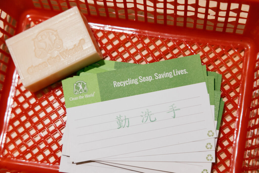 Soap recycling program with green education. Recycled soap and message cards.