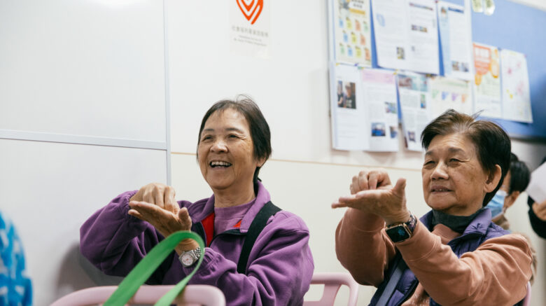 2 elderly learning the steps to washing their hands • Clean the World Asia charity events